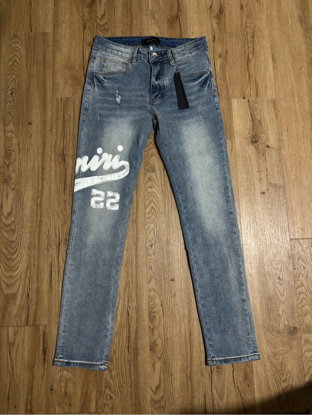 AMIRI Light Blue Skinny Jeans with White Graphic '22'